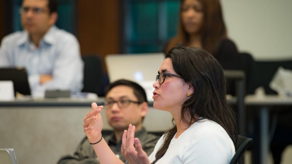 Woman speaking in class