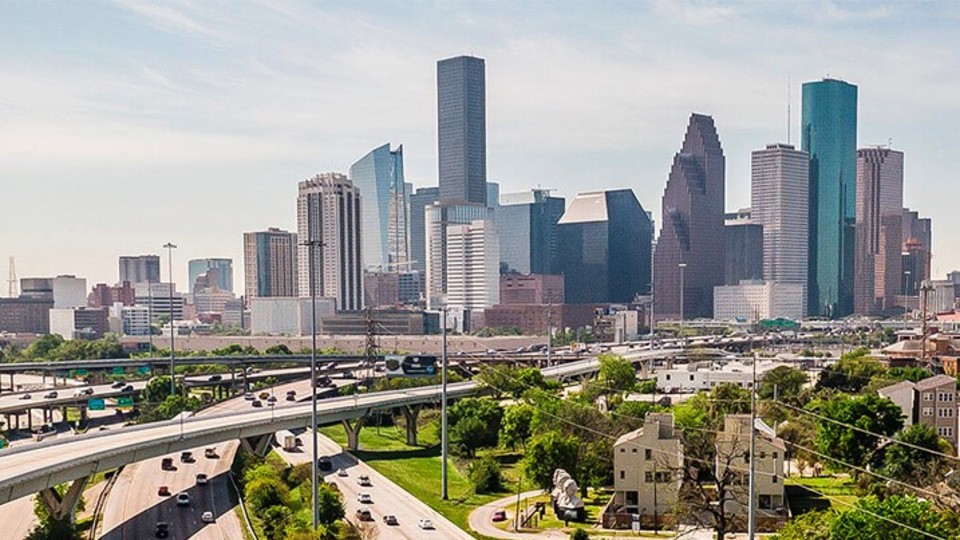 Houston Skyline with Be Someone Text