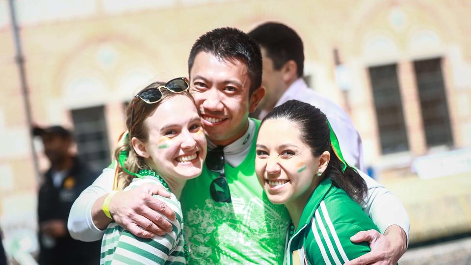 Two female and one male student posing together at Owlympics