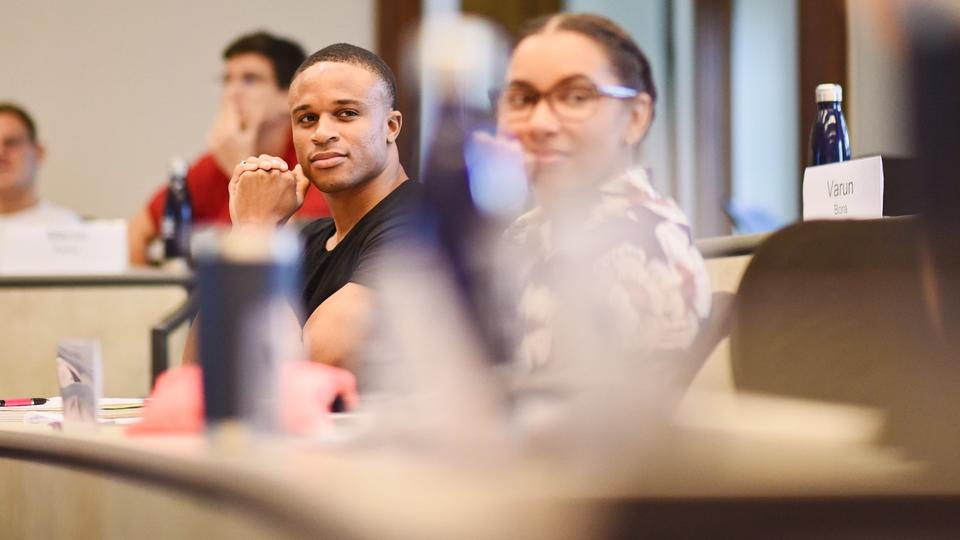 two students sitting in class