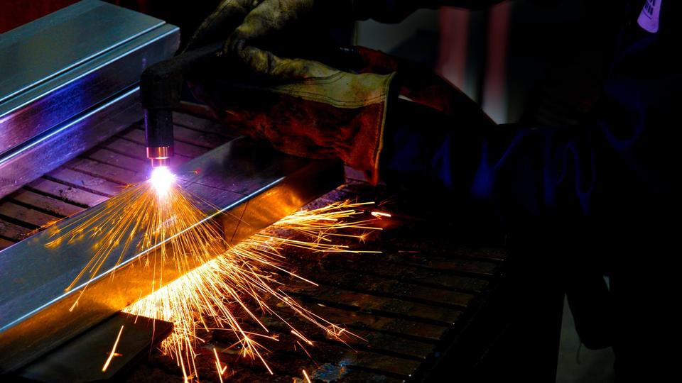 Welder working on metal