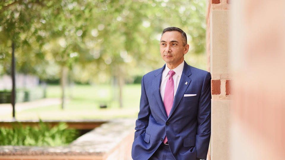 Dean Peter Rodriguez outside McNair Hall