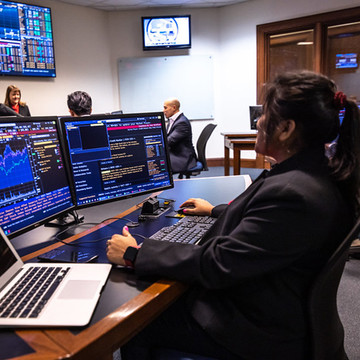 MBA students working in the Rice Business Finance Center.