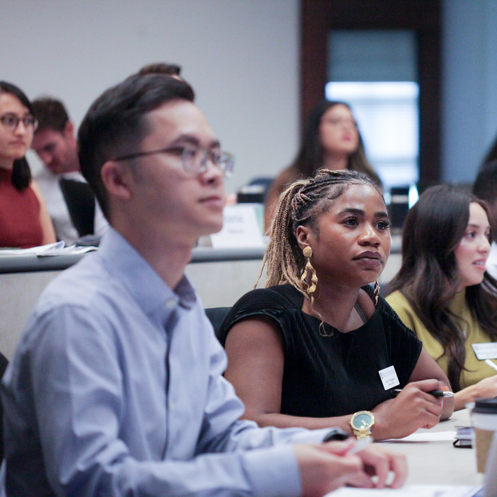 MBA student sitting in a classroom for an elective course