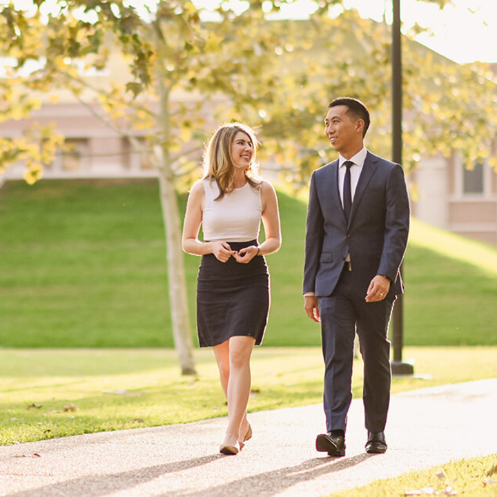 Hybrid MBA students walking to the Career Development Office