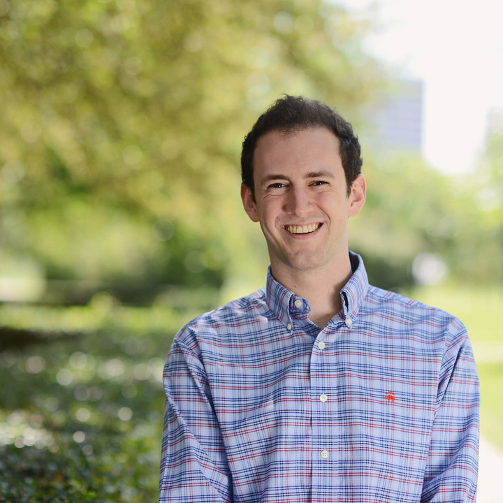 Rice Business Ph.D. student smiling in a photo outside